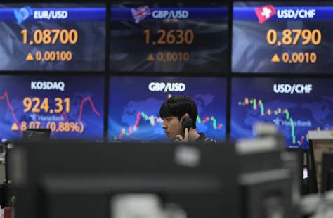 Stock market today: Asian shares weaken while Japan reports economy grew less than expected